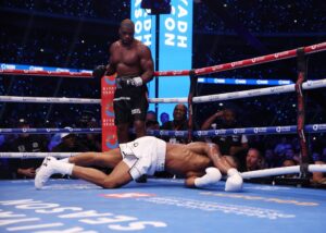 Read more about the article Spencer Oliver visibly gutted as he watches Anthony Joshua’s stunning KO defeat to Daniel Dubois while doing live commentary for talkSPORT