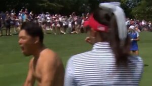 Read more about the article Why caddies ripped off shirts and bibs in reaction to Alison Lee’s hole-out at Solheim Cup