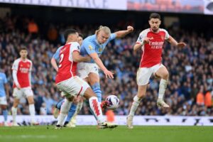 Read more about the article Man City vs Arsenal LIVE: Haaland out for 100th goal but Saka chasing Henry record as Premier League title rivals clash – kick-off time, team news and how to follow