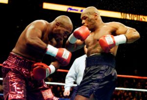 Read more about the article Mike Tyson claimed he fought through ‘broken back’ to KO rival in 49 seconds in final professional win