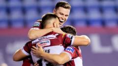 Read more about the article Wigan stay top as Leeds are put to the sword