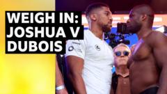 Read more about the article Joshua and Dubois face off at Trafalgar Square weigh-in