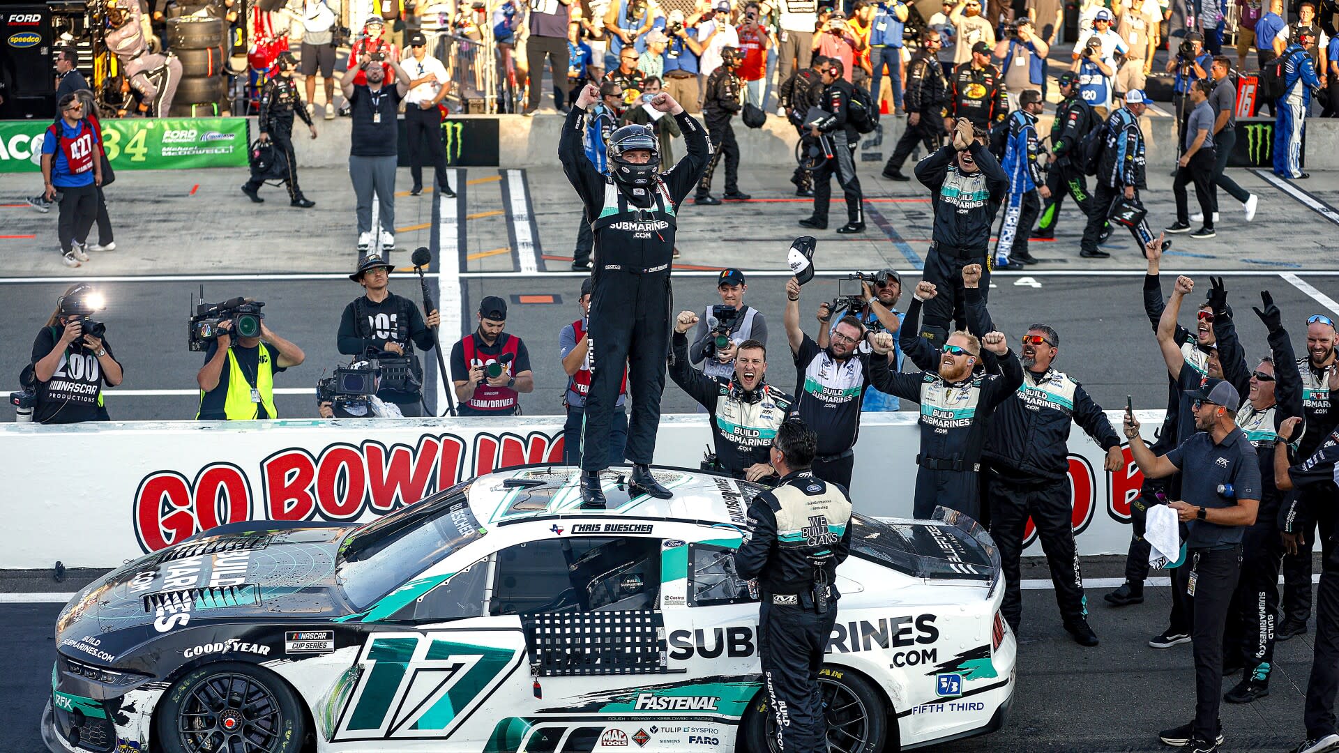 Read more about the article Chris Buescher wins at Watkins Glen with pass on final lap of overtime