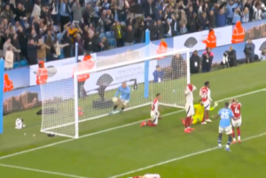 Read more about the article Unseen moment shows Erling Haaland throw ball at Gabriel’s head as Man City snatch equaliser at the death against Arsenal