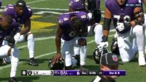 Read more about the article Lamar Jackson and Ravens ‘take knee in prayer’ as chain gang member receives CPR on sidelines before leaving Raiders game on stretcher