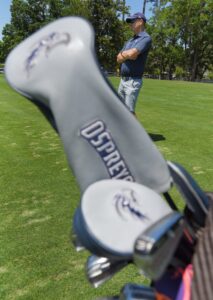 Read more about the article An officer and a golfer: UNF Ospreys welcome Navy veteran Tyler Gulliksen to the golf staff