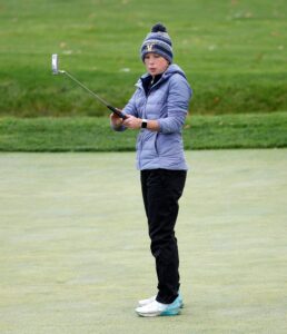 Read more about the article Through wind and cold and sometimes rain, Victor junior runs away with girls golf title