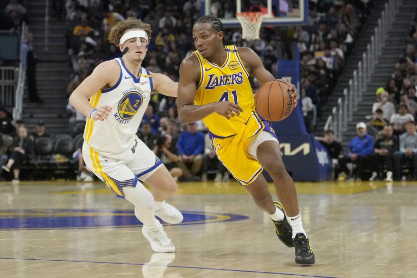 You are currently viewing Lakers sign Quincy Olivari to two-way contract, waive Colin Castleton