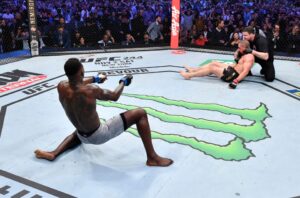 Read more about the article Israel Adesanya became undisputed champion when he sent Robert Whittaker dancing into canvas with one-second KO