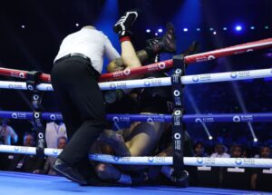 Read more about the article Ben Whittaker punches hole in wall as he is wheeled off to hospital after freak injury in Liam Cameron fight