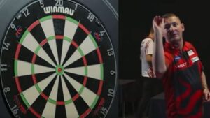 Read more about the article Nathan Aspinall apologises after launching dart at board in anger during match