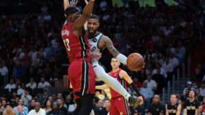 Read more about the article Lillard scores 37 points and Giannis-less Bucks hold off Heat 106-103 to move to 3-0 in Cup play