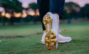 Read more about the article WNBA star Caitlin Clark’s shiny gold Nike golf shoes turn heads at LPGA pro-am