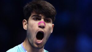 Read more about the article Alcaraz shrugs off illness to beat Rublev in Turin