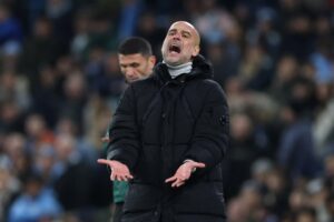 Read more about the article Man City create unwanted Champions League history as Pep Guardiola shows off scratched face following more misery