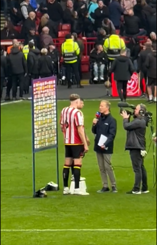 You are currently viewing Fans in stitches as Sheffield United star forced to stand on stool next to teammate for interview