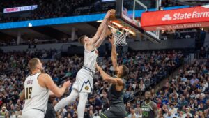 Read more about the article Watch Christain Braun with early Dunk of the Year candidate on Rudy Gobert’s head