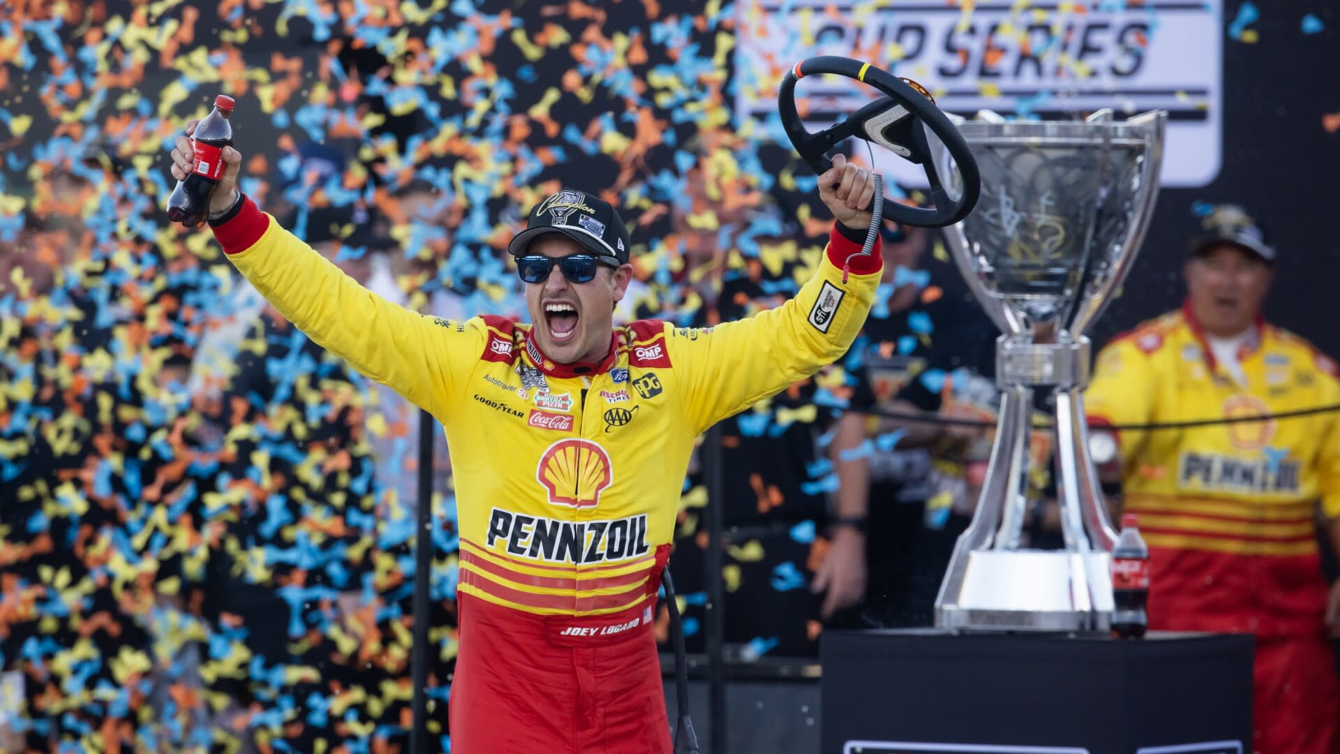 You are currently viewing Joey Logano wins third NASCAR Cup championship, beating Ryan Blaney in 1-2 Penske finish at Phoenix