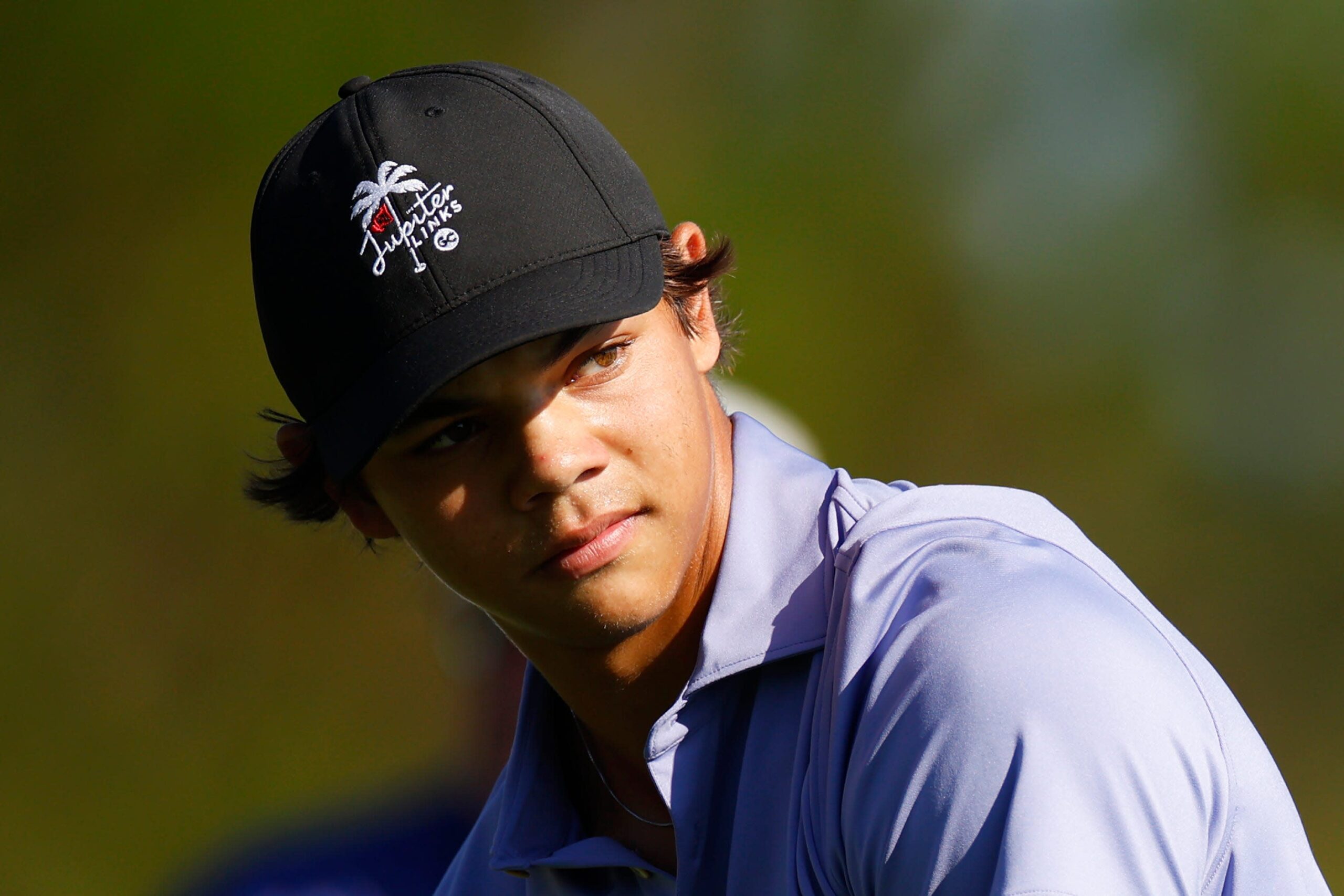 You are currently viewing Charlie Woods wearing dad Tiger’s TGL team hat at PNC Championship