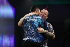 Read more about the article ‘The way it goes’ – Peter Wright reveals exactly what was said during respectful Luke Humphries embrace after upset win