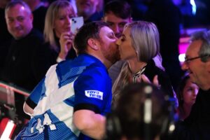 Read more about the article Cameron Menzies reveals he wooed darts girlfriend Fallon Sherrock with KFC and claims she’s made him a better player