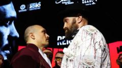 Read more about the article Fury and Usyk stare at each other for 11 minutes in astonishing face-off