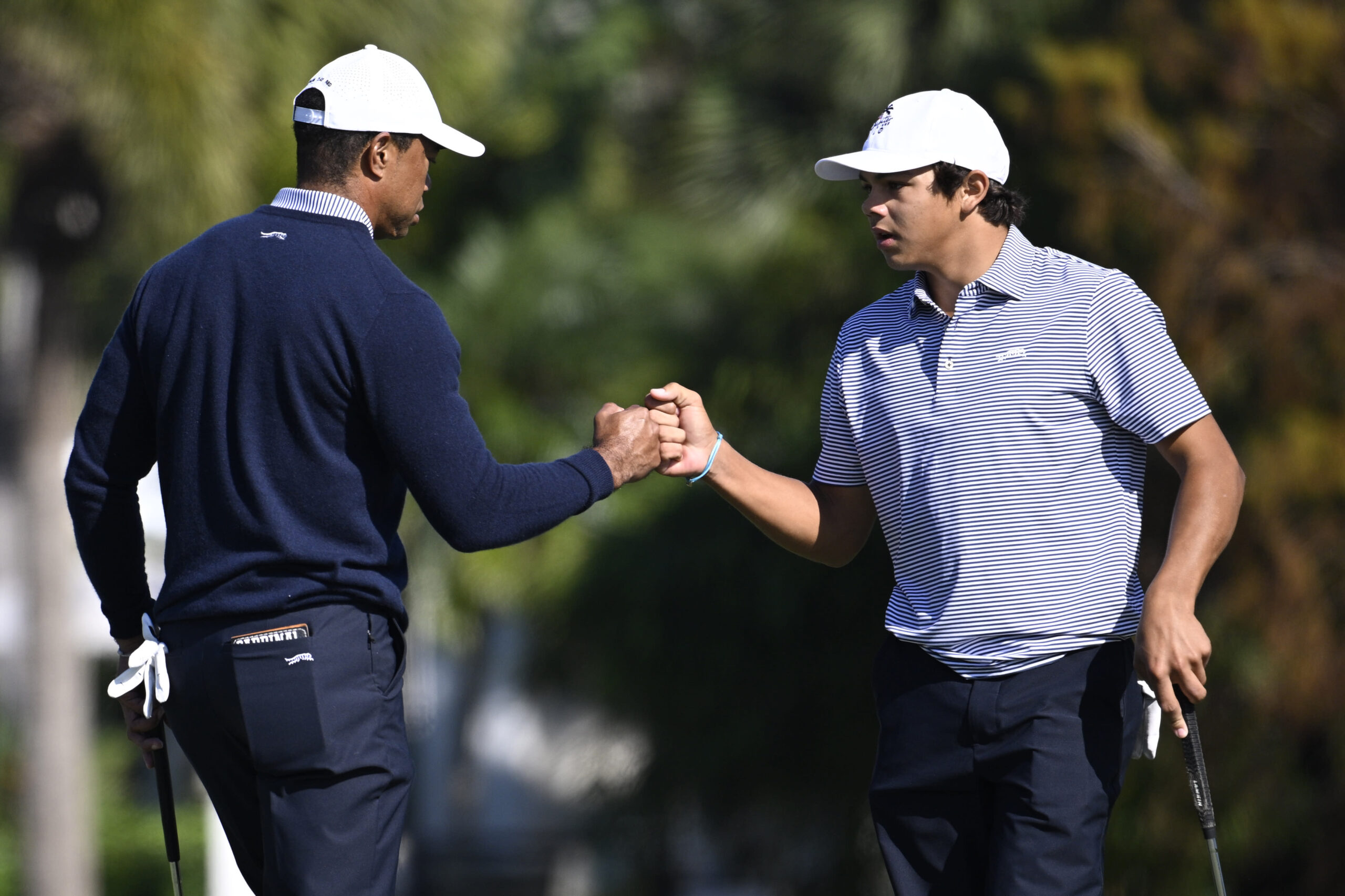 You are currently viewing Tiger Woods and son Charlie share the lead at PNC Championship