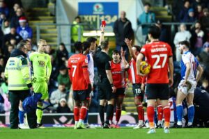 Read more about the article ‘We’ve got to look at it’ – Red-faced Luton star shoved off pitch by furious teammate