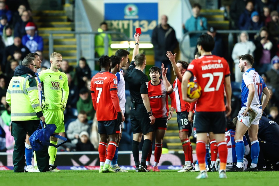 You are currently viewing ‘We’ve got to look at it’ – Red-faced Luton star shoved off pitch by furious teammate