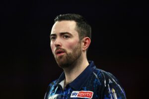 Read more about the article Luke Humphries crashes OUT of World Darts Championship as Peter Wright delivers on promise in huge upset