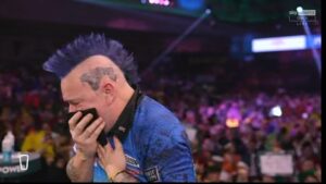 Read more about the article Peter Wright struggles to complete interview after battling through illness to bravely win match