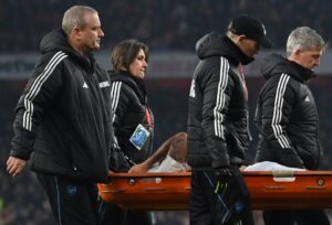 Read more about the article Arsenal star Gabriel Jesus has head in hands as he stretchered off pitch after awkward collision