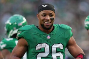 Read more about the article ‘Stay poor’ – Saquon Barkley explains to Tom Brady why he slid to avoid TD and cost bettors millions