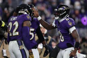 Read more about the article Lamar Jackson makes NFL history with postseason record as fans declare Ravens star ‘best dual-threat QB of all time’