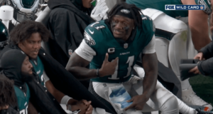 Read more about the article Cameras capture odd moment between Eagles star receiver reading a book while on the bench during playoff game