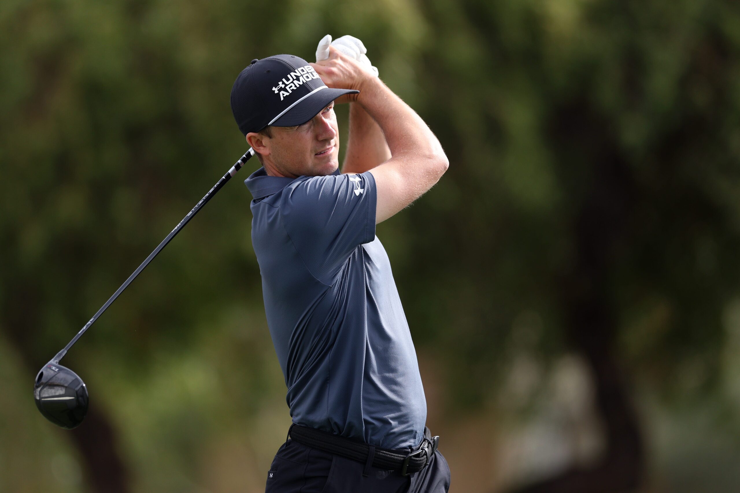 You are currently viewing Watch: Jordan Spieth makes amazing par after using his putter to get out of a bush