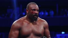 Read more about the article Bloodied Chisora beats Wallin in UK finale