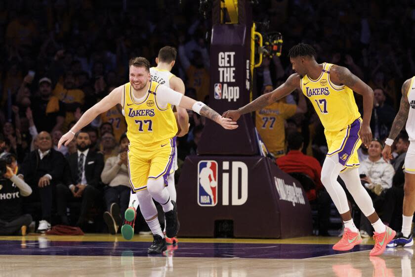 You are currently viewing Luka Doncic embraced by LeBron James and L.A. in his memorable Lakers debut