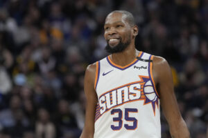 Read more about the article Kevin Durant says it’s ‘all love’ with Gary Payton after exchanging trash talk at Suns-Warriors