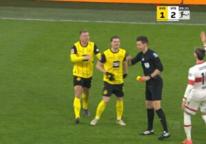 Read more about the article Borussia Dortmund star squares up to referee in shocking moment as teammates forced to intervene