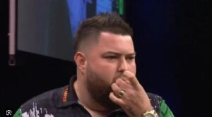 Read more about the article ‘Imbeciles’ – Michael Smith had perfect response to whistling crowd in Luke Littler match