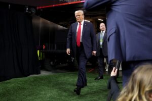 Read more about the article Donald Trump completes 650-mile dash from golf with Tiger Woods to historic Super Bowl in New Orleans