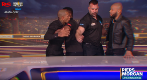 Read more about the article Chris Eubank Jr and Conor Benn pulled apart by security in heated face-off with Piers Morgan as teaser trailer released