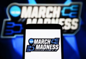 Read more about the article World’s sixth richest man worth $160bn makes $1m March Madness employee challenge easier in quest ‘to give away money’