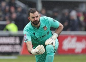 Read more about the article Triple Wrexham promotion winner becomes first player to confirm exit after Championship climb