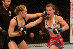 Read more about the article ‘Go through me first’ – Former UFC champion welcomes Ronda Rousey trilogy fight amid potential MMA return