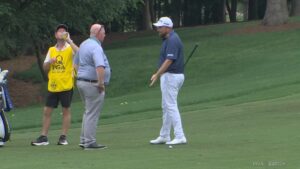Read more about the article Furious Shane Lowry takes huge chunk out of fairway and flips off ball after arguing with PGA official