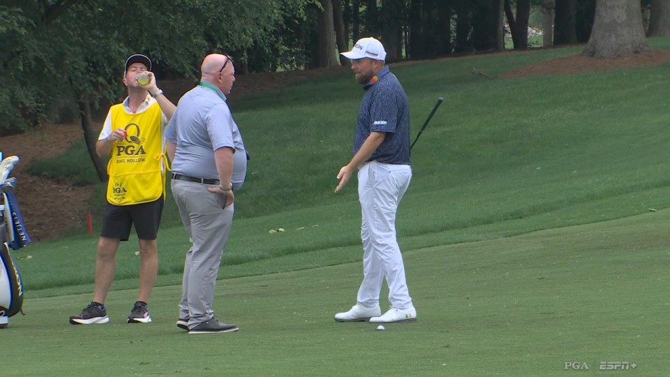 Read more about the article Furious Shane Lowry takes huge chunk out of fairway and flips off ball after arguing with PGA official