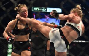Read more about the article Jake Paul signs former UFC champion who knocked out Ronda Rousey