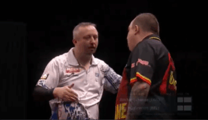 Read more about the article ‘Silly nonsense’ – Darts star ignores rival in frosty post-match exchange after blowing lead